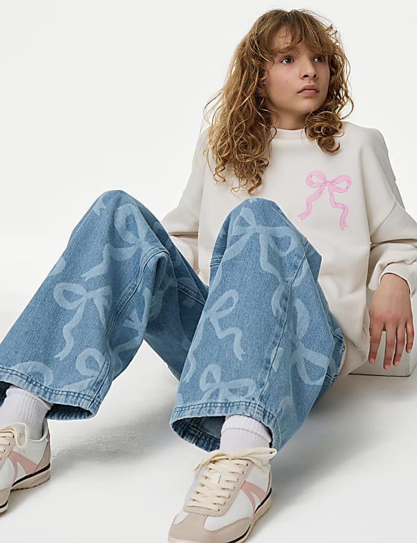 SD_04_T74_3339E_HP_X_EC_0-54940 Wochenendangebot Denim-Jeans mit weitem Bein mit Schleifenmuster (6–16J.)